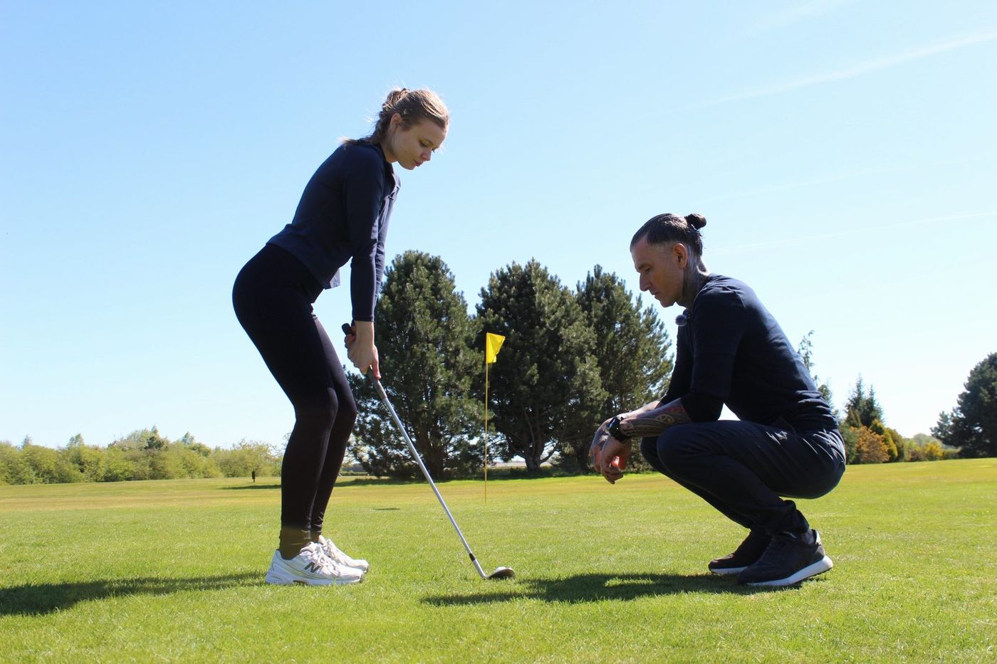 Dan coaching a student on the course